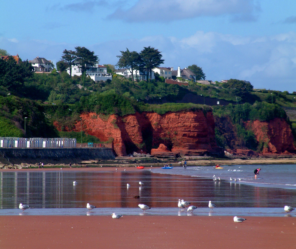 Preston Sands beach with red cliffs